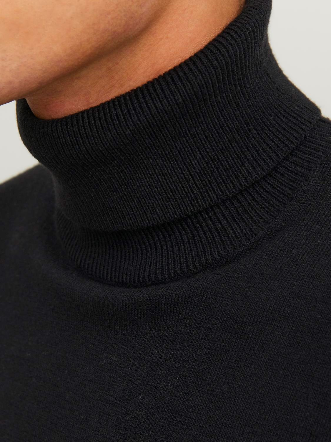Pull col roulé uni