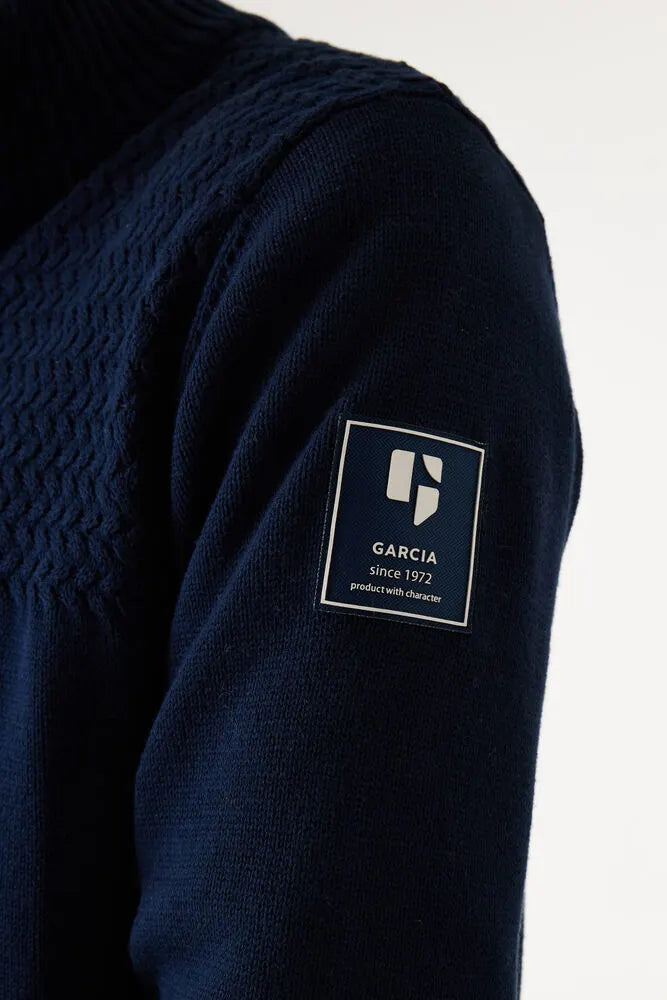 Pull col zipé